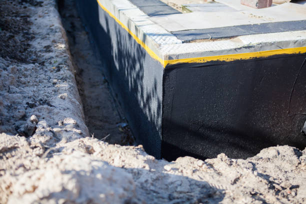 Professional Waterproofing technician working in Jackson, OH
